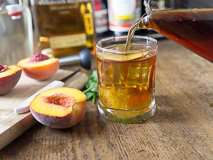 bourbon cocktail bourbon peach tea smash ethnicspoon