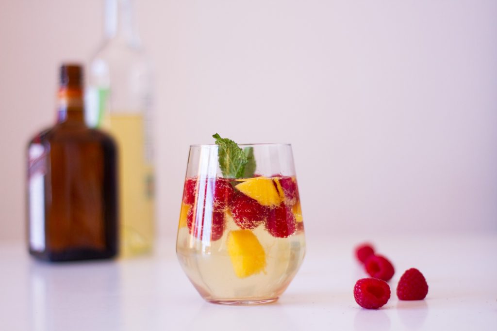 fruit cocktails white sangria with mango and berries darylskitchen