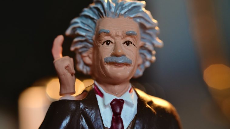 man in black suit jacket figurine