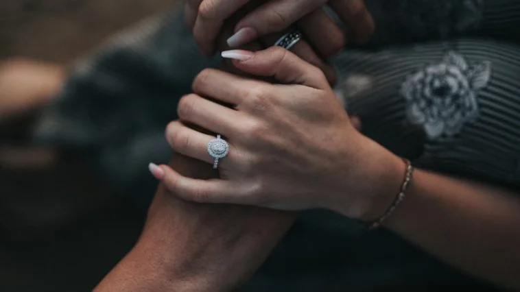 man and woman holding each others hands