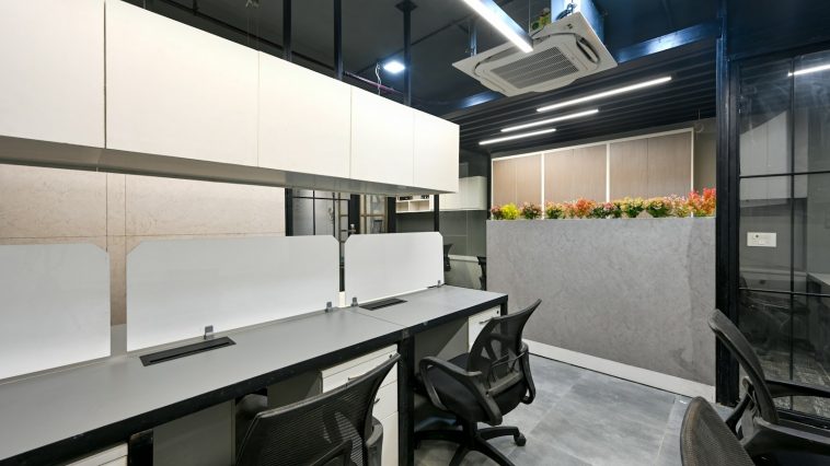 a conference room with a table and chairs